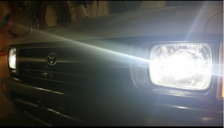 Illustration for article titled Toyota Highlander retrofit Hella 5 bi xenon projector
